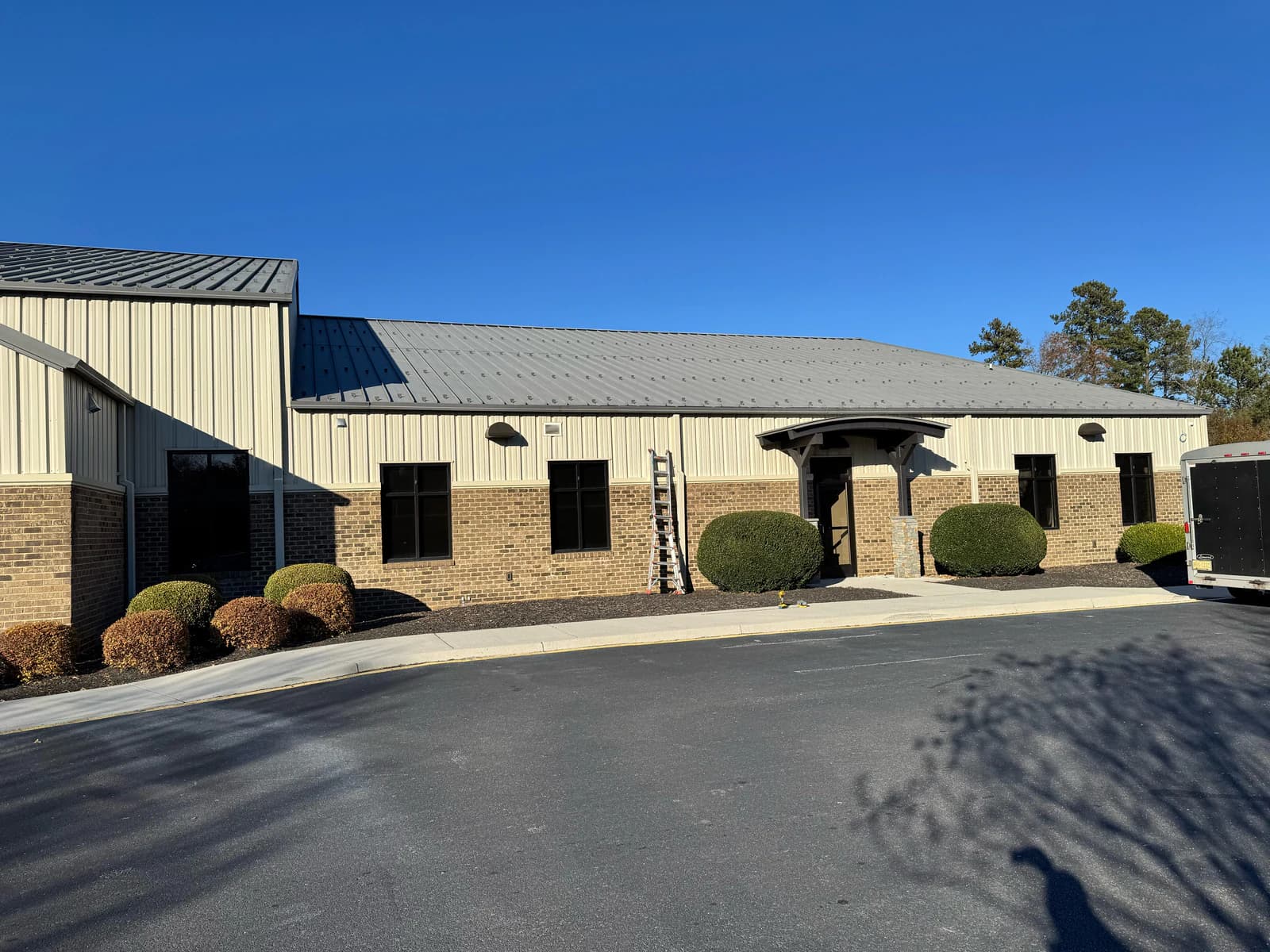 Life Co Chester exterior with distributed SoundTube speakers mounted along the building