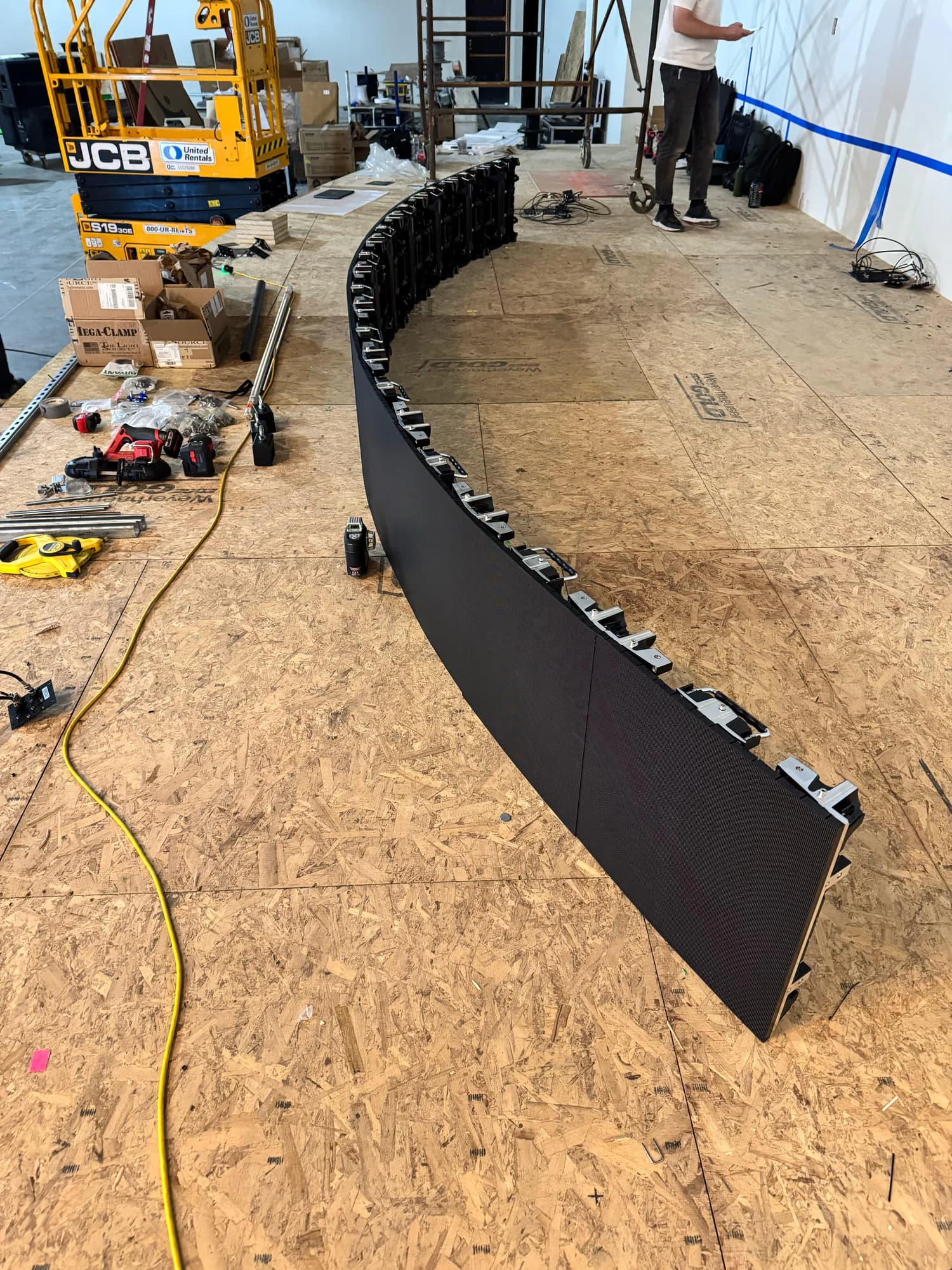 Curved Qohr LED wall being assembled at New Vintage Church