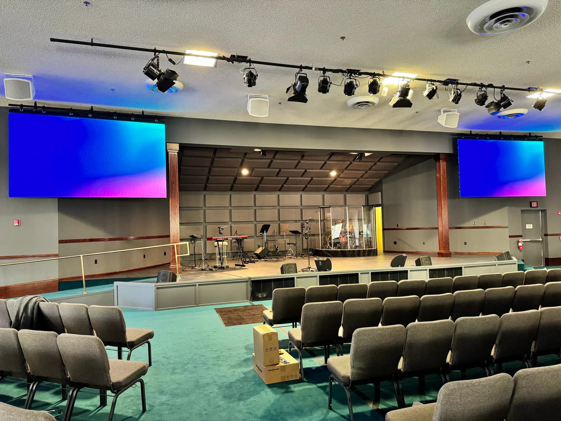 Left-side view of both MountainHouse LED screens across the sanctuary