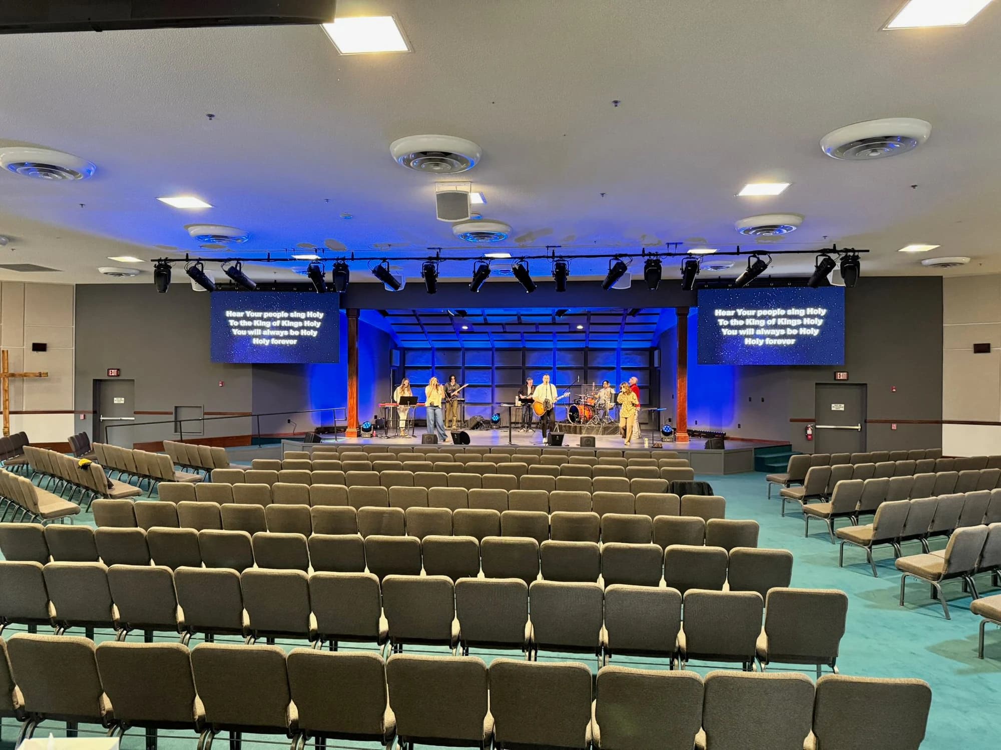 Completed MountainHouse stage and house lighting across the full sanctuary