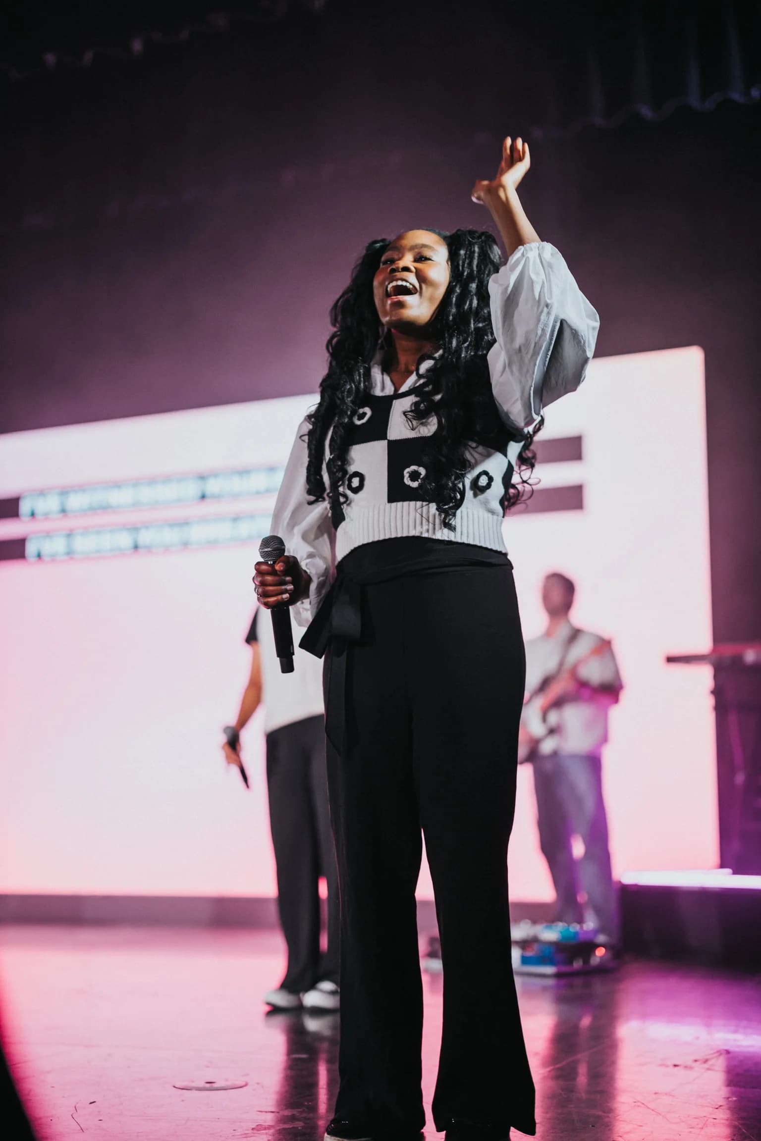 Zoe Church South Bay vocalist leading worship in front of the LED wall