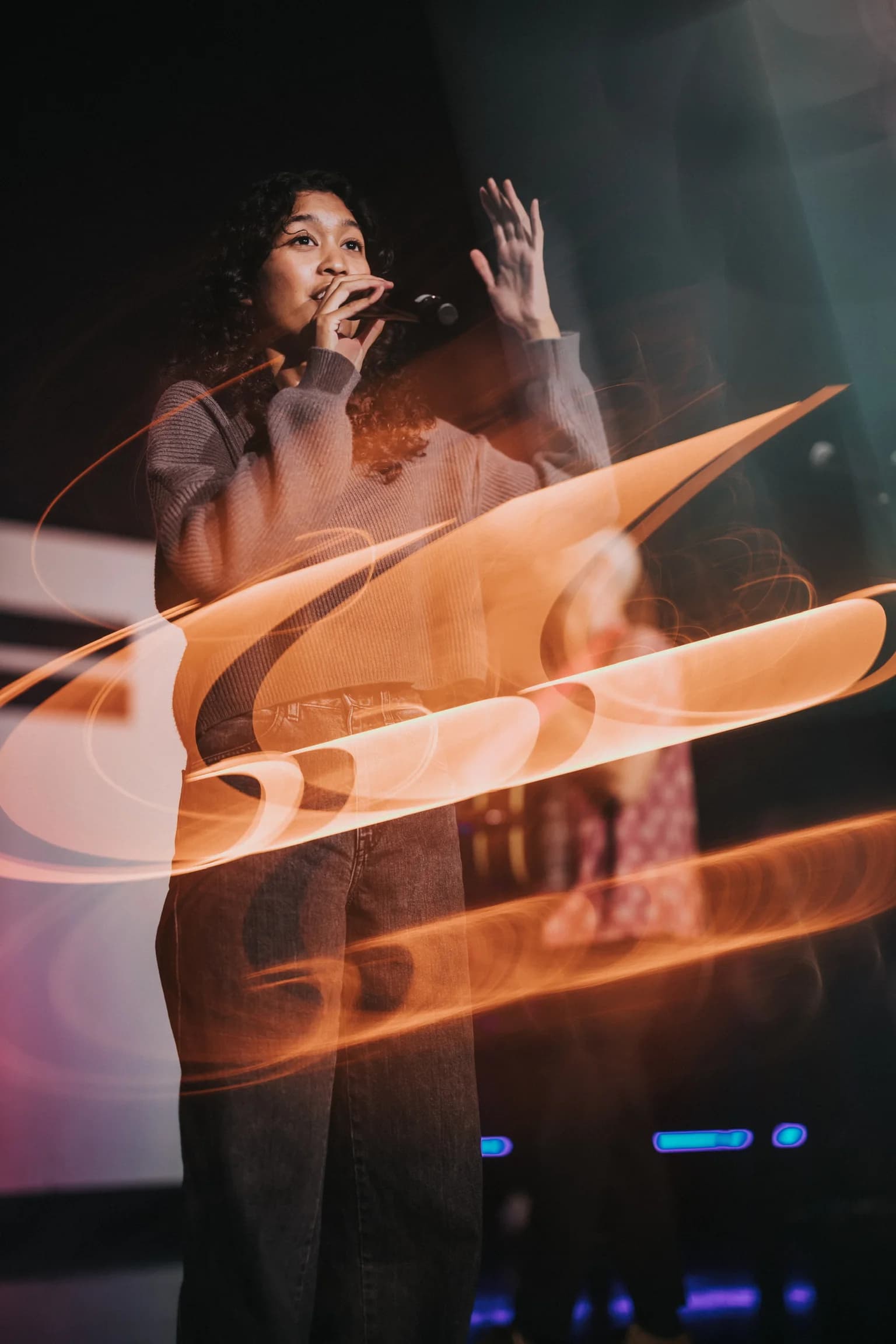 Zoe Church South Bay vocalist framed by moving stage light
