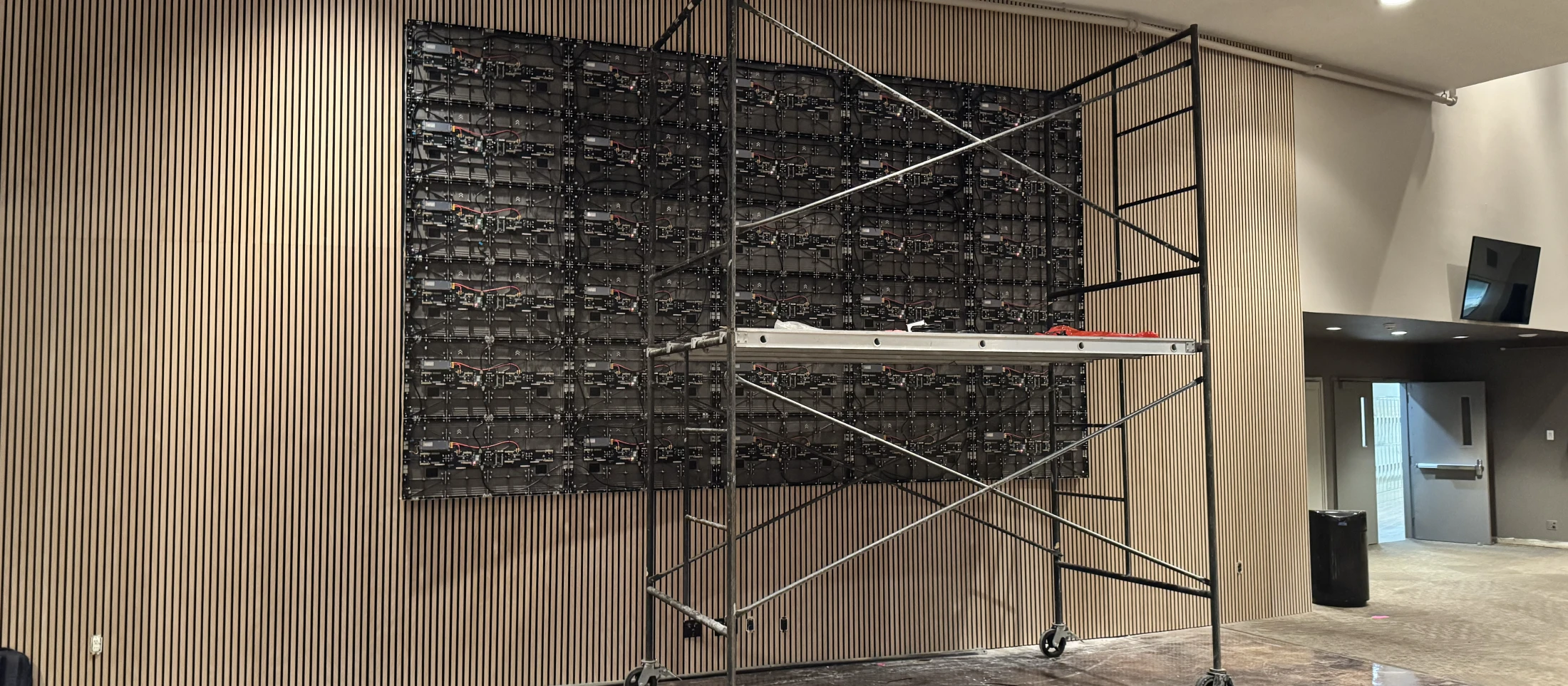 Rear of the Mannahouse PDX lobby LED wall during cabinet installation